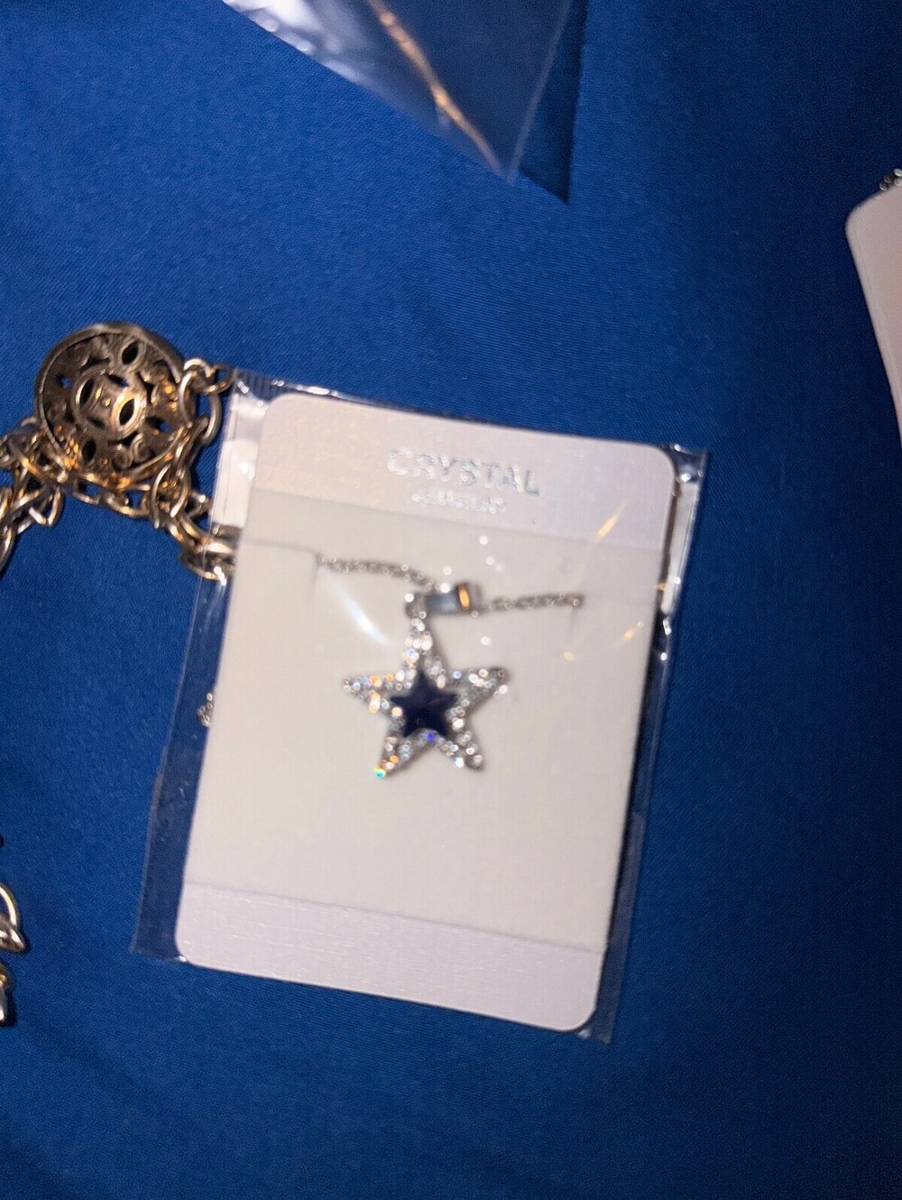 Elegant Star-Shaped Crystal Pendant Necklace with Blue Center Stone